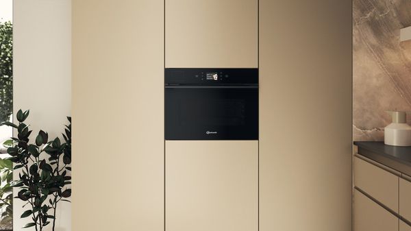 Bauknecht Mikrowelle Einbaugerät BCT9A9PHTSK Schwarz Elektronisch 53 Kombinationsbetrieb mit Mikrowelle 950 Lifestyle frontal