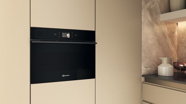 Bauknecht Mikrowelle Einbaugerät BCT9A9PHTSK Schwarz Elektronisch 53 Kombinationsbetrieb mit Mikrowelle 950 Lifestyle perspective